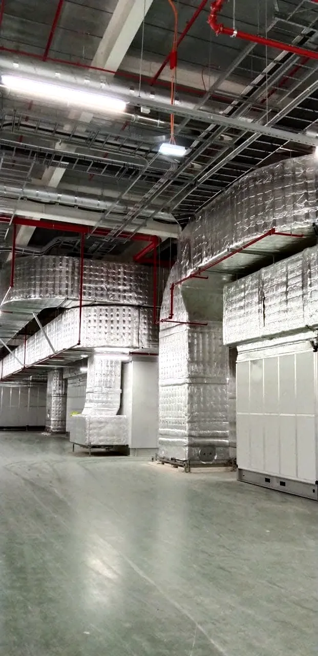 Insulated ventilation ductwork and air handling units in a mission-critical technical hall