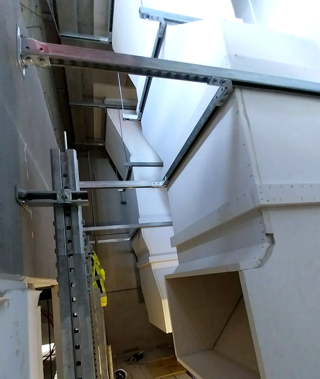 PROMAT board ductwork mounted in a confined building services zone